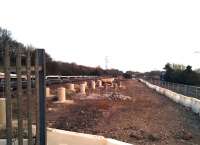 Evening view South at the new Bermuda Park station between Nuneaton and Coventry on 8 April 2015 [see image 50607]. The Southbound platform is substantially complete, with supports for the Northbound platform now in place. Opening is due in one month.<br><br>[Ken Strachan 08/04/2015]