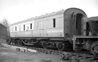 Former LMS brake coach, branded for Tartan Arrow / Security Coach /   Raleigh Industries Ltd. Presumably at McMullen Bros, Gartsherrie, for scrap in November 1977. [Ref query 6892]<br><br>[Bill Roberton /11/1977]