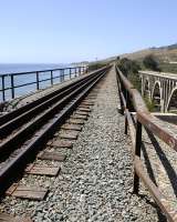 Steel trestle carrying Southern Pacific Railroad, between Los Angeles and Oakland, around 25 miles north of Santa Barbara. Route of the Coastal Starlight and Pacific Surfliner. To the left, the Pacific Ocean, to the right one of the iconic 1930's reinforced concrete bridges of the original Highway 1, now abandoned. Sadly no SP Streamliner on the track, no Mustang on Highway 1.<br><br>[Brian Taylor 12/04/2015]