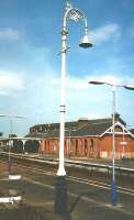 This fine piece of platform furniture seen at Dumfries in May 1998 puts the rather humdrum modern replacements in the shade (and has managed to retain most of its paint).<br>
<br><br>[David Panton 17/05/1998]