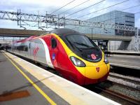 Pendolino 390103 in WW1 Remembrance livery, London bound at Milton Keynes Central on 12 April 2015.<br><br>[John Steven 12/04/2015]