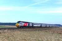 Virgin Trains East Coast HST not long into its journey from Inverness to London Kings Cross approaching Moy on 9 April 2015. 43310 is in the lead with 43257 bringing up the rear.<br><br>[John Gray 09/04/2015]