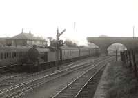 Parkhead class N2 0-6-2T  no 69563 passing Garngad on 8 May 1956 at the head of a Hyndland - Springburn train. Garngad station had closed to passengers in 1910. [Ref query 5993] <br><br>[G H Robin collection by courtesy of the Mitchell Library, Glasgow 08/05/1956]