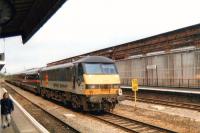 Railfreight Distribution 90032 is on the rear of a GNER service being diesel hauled between Wakefield Westgate and Leeds in July 1999 during engineering works along the direct route.<br><br>[David Pesterfield 20/07/1999]