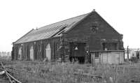 A general view of the repair shop at Tweedmouth from the weed infested shed yard on 19 September 1970. Inside is class 03 shunter No D2056 whose services were not required over the weekend<br><br>[Bill Jamieson 19/09/1970]