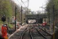 Driver's view of Queens Road Junction from a Bury to Manchester tram. In main line days this was where the line to Cheetham Hill diverged from the electric line into Victoria. Now it is one of the access points to Queens Road Metrolink Depot. Queens Road tram station is just under the bridge on the Victoria line. <br><br>[Mark Bartlett 20/04/2015]