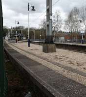 Milngavie viewed from the trackbed of the former third platform - now a walkway beside the station.<br><br>[Ewan Crawford 20/04/2015]