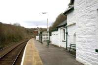 Platform view at Pont-y-Pant on 14th April 2015. The former Gents (centre) which now forms part of the accommodation of the private residence in the station building seems more generously proportioned than the present shelter for passengers - and certainly more substantial in construction. <br><br>[Colin McDonald 14/04/2015]