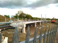 The Northbound platform at the new Bermuda Park station appears to be almost finished in this Saturday afternoon view South on 25 April 2015 [see image 50936].<br><br>[Ken Strachan 25/04/2015]