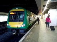 Passengers join 170517, forming the 0949 to Hereford, at Birmingham New Street on 18 April 2015.<br><br>[Ken Strachan 18/04/2015]