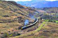 The <I>Royal Scotsman</I> west of Morar on 2 May 2015, with Deltic 55022 <I>Royal Scots Grey</I> masquerading as 55003 <I>Meld</I> at the head of the train. 66735 is discreetly tagged onto the rear.<br><br>[John Gray 02/05/2015]