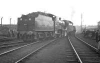 SR Schools Class 4-4-0 no 30925 <I>Cheltenham</I> and Ex-LMS 2P 4-4-0 no 40646 at Annesley shed on 11 May 1962. The pair had arrived to work the RCTS <i>East Midlander No 5</I> out of Nottingham Victoria two days later. [See image 32751]<br><br>[K A Gray 11/05/1962]