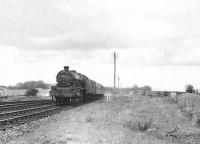 Jubilee 45657 <I>Tyrwhitt</I> photographed at Thirdpart Junction on 6 May 1954 with a Kilmarnock to Ayr train. [Ref query 2631]   <br><br>[G H Robin collection by courtesy of the Mitchell Library, Glasgow 06/05/1964]