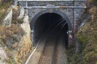 The Roman Bridge Tunnel, seen here from the Blaenau end, is surprisingly dated 1891 (the line through to Blaenau was opened in 1879). This is actually the date the tunnel was lined.<br><br>[Colin McDonald 14/04/2015]