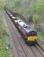 DBS 66004 passes through the closed Craiglockhart Station on the Edinburgh 'sub' on 4 May 2015 with the 6S58 Lackenby - Dalzell 'slabs'.<br><br>[Bill Roberton 04/05/2015]