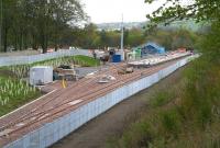 The Borders Railway terminus at Tweedbank on Bank Holiday Monday 2015. Much going on, including work on the car parking area and various landscaping/planting activities. The blue-cladded structure is referred to on the BR website as the 'Train Operators Building'.   <br><br>[John Furnevel 04/05/2015]
