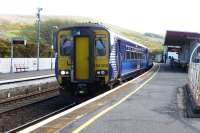 The 14.33 to Glasgow Central via Kilmarnock awaiting its departure time at Girvan on 7 May 2015. Arrival in Central is 16.33, or get off at Ayr at 15.18 and catch the 15.24 via Paisley and arrive at 16.13.<br><br>[Colin Miller 07/05/2015]