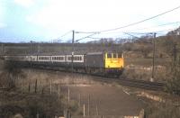 A class 86 locomotive at the head of a southbound train at Craigenhill Summit in 1980. [Ref query 12865]<br><br>[Colin Miller //1980]