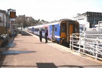 Just about ready for <I>'the off'.</I> The crew of the 1211 Abellio ScotRail service to Glasgow Queen Street, during a final exchange prior to departure from Oban on 22 April 2015.<br><br>[John Furnevel 22/04/2015]