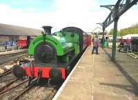 <I>'I'm sure there was an awning up there before I blew off steam.'</I> Saddle tank 'Birkenhead' looking guilty at Elsecar Heritage Centre on 4th May. The red engine in the background is called 'Earl Fitzwilliam'. A mobile sweetshop operating from a vintage van can just be seen on the left.<br><br>[Ken Strachan 04/05/2015]