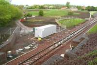 The points controlling the changeover from double to single line operation at Kings Gate on the Borders Railway just south of the Edinburgh City By-pass. As can be seen in this view north west on 10 May 2015 the whole area has recently been cleaned up and landscaped. The white notice reads <I>Kings Gate Junction</I>.  <br><br>[John Furnevel 10/05/2015]