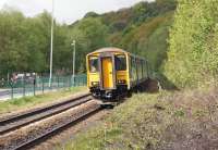 The first northbound service to use the re-instated Todmorden Curve on 17 May was the 2J60 0840 hrs Manchester Victoria - Clitheroe, seen here about to arrive at Todmorden. The service involved a reversal at Blackburn and replaced the normal route from Manchester via Bolton which is closed at weekends due to the engineering work on Farnworth Tunnel.<br><br>[John McIntyre 17/05/2015]