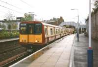 Freshly outshopped 314215 at Hamilton Central in September 1997 with a service for Dalmuir via Blantyre. <br><br>[David Panton 30/09/1997]