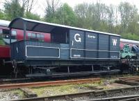 Something else that used to belong in Exeter [see image 50901]. This guards van is now a resident of Yorkshire, seen here on the Elsecar Heritage Railway in May 2015. The engine to its right looks interesting - it's either a 3 cylinder unit, or one of its exhaust downpipes has gone missing.<br><br>[Ken Strachan 04/05/2015]