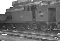 Class N7 0-6-2T 69698 in front of the unique high capacity coaling plant at Stratford shed in October 1961.<br><br>[K A Gray 09/10/1961]