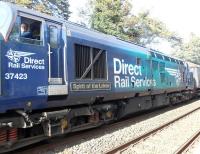 Close-up of DRS 37423 <I>Spirit of the Lakes</I> at Dalston on 22 May with one of the new loco hauled services which commenced operations 4 days earlier. These are operated by DRS, on behalf of Northern Rail to increase seating capacity at peak times. Living just 100 yards from the line our cups and saucers do a bit of a dance when these services pass by.<br><br>[Brian Smith 22/05/2015]