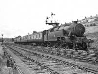 The mid-day train from Rutherglen approaching Possil station on 22 July 1957 behind Fairburn tank 42126. [Ref query 10059]<br><br>[G H Robin collection by courtesy of the Mitchell Library, Glasgow 22/07/1957]