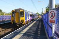 Platforms 1, 2 and 3 at Leyland have been extended to allow them to accommodate 6 car sets during the engineering work at Farnworth Tunnel. 156482 arrives on Platform 1 on 20 May 2015 forming a Liverpool to Preston service.<br><br>[John McIntyre 20/05/2015]