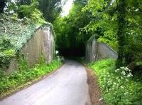 Satnavs don't generally show disused railways; but it's hard to argue with remnants like these impressive abutments, which rest a few yards to the South of the A433 from Cirencester. Tetbury is to the right.<br><br>[Ken Strachan 23/05/2015]