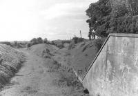 The former Lanarkshire and Ayrshire Railway Junction at Kilwinning East on 24 May 1960 looking south. The line to Irvine (Bank Street) veered left and the Ardrossan line right. [Ref query 12308]<br><br>[G H Robin collection by courtesy of the Mitchell Library, Glasgow 24/05/1960]