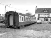 A Mk1 coach at the rear of the Leadburn Inn awaiting conversion to a dining car in April 1985.  The Inn, located opposite the site of Leadburn station on the A6094,  burned down in 2005 and was rebuilt in 2010. The coach survived the fire although its current whereabouts are unknown.<br><br>
Note from Alastair Taylor:<br><br>
According to the Vintage Carriages Trust website, this TSO was originally M4427 and was scrapped (presumably on site) in 2006.<br><br>[Bill Roberton 07/04/1985]