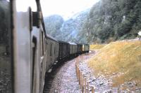 A Kyle - Inverness train running between Loch Carron and the then new road near Stromeferry in August 1970.<br><br>[Colin Miller /08/1970]