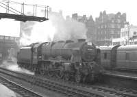 46160 <I>'Queen Victoria's Rifleman'</I> arrives at Carlisle station from Kingmoor shed on a wet and windy 10 August 1963. The Royal Scot was rostered relief locomotive for the incoming 1.57pm summer Saturday Gourock - Birmingham New Street... by which time the weather had not improved! [See image 33214]<br>
<br>
<br><br>[K A Gray 10/08/1963]