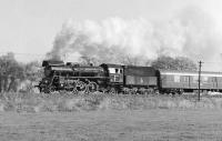 Polish State Railways 2-6-2 No. Ol49-23 restarts the 08:40 Wolsztyn to Sulechow from the station stop at Chwalim in western Poland on 11th October 1990. Within three years the passenger service on this line had been 'privatised' and would succumb altogether within a short time - no doubt the carrying of mails by train (the first vehicle behind the tender is a postal vehicle) has also gone the same way.<br><br>[Bill Jamieson 11/10/1990]