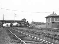 After running through Crosshouse station, Caley <I>Jumbo</I> 57353 is about to pass Crosshouse Junction signal box on 6 May 1953 with empties from the Dalry direction. [See image 45840] <br><br>[G H Robin collection by courtesy of the Mitchell Library, Glasgow 06/05/1953]