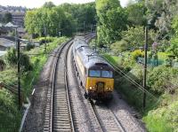 Humble duty for <I>Northern Belle</I> liveried 57312 <I>Solway Princess</I> and a DRS classmate as they drop down the bank tgowards Lancaster with the morning Crewe to Sellafield flasks on 4th June 2015.  The second loco is probably 57306 as the pair had worked flasks from Berkeley to Crewe the previous evening.  <br><br>[Mark Bartlett 04/06/2015]