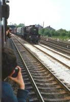 Photograph taken from a carriage window of <I>Scottish Grand Tour no 5</I> on the WCML near Carnforth on 1 June 1968. Lostock Hall Black 5 44942 is approaching from the south with a parcels train.<br><br>[John Robin 01/06/1968]