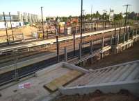 Almost there. Coventry Arena on 4 June 2015. Waiting shelters, green plastic seats, a Northbound platform, and a set of steps on the Arena side have been installed since my last shot in this direction [see image 50666].<br><br>[Ken Strachan 04/06/2015]