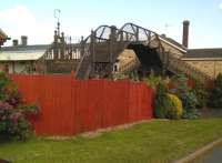 A close-up view of the Seaton station footbridge [see image 51582] reveals a stucture almost as complex, but probably more decrepit, than that at Wymondham {q.v.}. Nice, isn't it?<br><br>[Ken Strachan 07/06/2015]