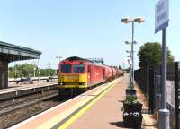 DB Schenker 60063 heading the Theale Sidings to Robeston Murco Tanks west through Didcot on 11 June 2015.<br><br>[Peter Todd 11/06/2015]