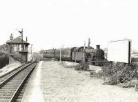 A Dalmuir Riverside - Rutherglen service arrives at Yoker Ferry station on 4 September 1958. The train is hauled by Dawsholm shed's Stanier 3P 2-6-2T 40189.<br><br>[G H Robin collection by courtesy of the Mitchell Library, Glasgow 04/09/1958]