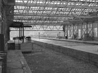 The trackless interior of Oban train shed on 28 September 1985.  37191 waits outside with a train for Glasgow.<br><br>[Bill Roberton 28/09/1985]