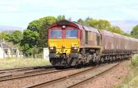 Approaching Larbert Junction from the north on 20 May 2015 is DBS 66067   with a return empty working from Longannet power station to Hunterston coal import terminal.<br><br>[John Furnevel 20/05/2015]