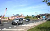 View of the Bargeddie bridges  on 12th June - the new M8 railway viaduct under construction on the left and the <I>Cutty Sark</I> bridge over the A8 on the right. The new bridge when completed will be moved to its final position during a two week line closure in July. [See image 50755]<br><br>[Colin McDonald 12/06/2015]