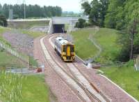 Having cleared the Edinburgh City Bypass, a ScotRail 158 heads south towards King's Gate points on the early afternoon of 15 June during a driver training run to Tweedbank. <br><br>[John Furnevel 15/06/2015]