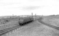 A Fraserburgh - Aberdeen DMU passing Kirkton shortly after commencing its journey south on 18 August 1960. On the right the St Combs branch is starting to turn east towards the coast.<br><br>[G H Robin collection by courtesy of the Mitchell Library, Glasgow 18/08/1960]